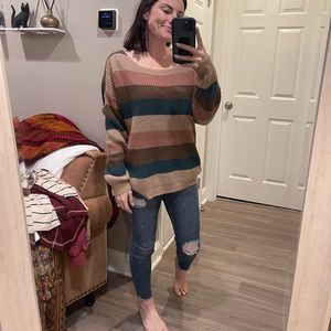 Striped sweater with knot on back